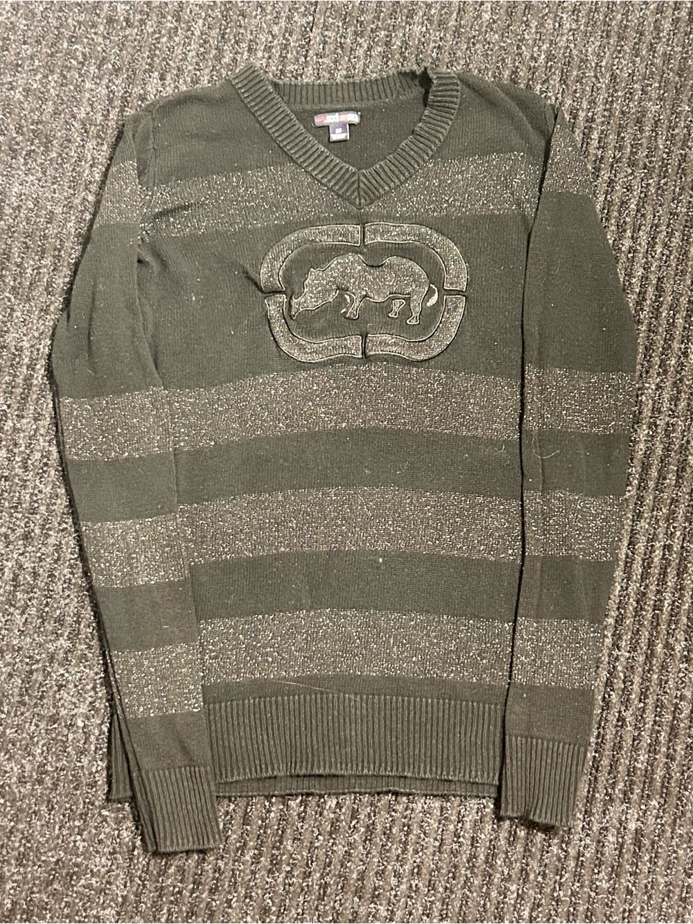 Woman’s black Striped V-Neck Sweater with Embossed Logo